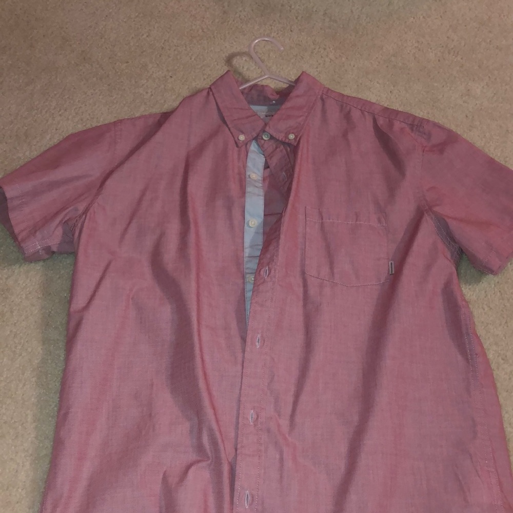 Pink buttoned down shirt